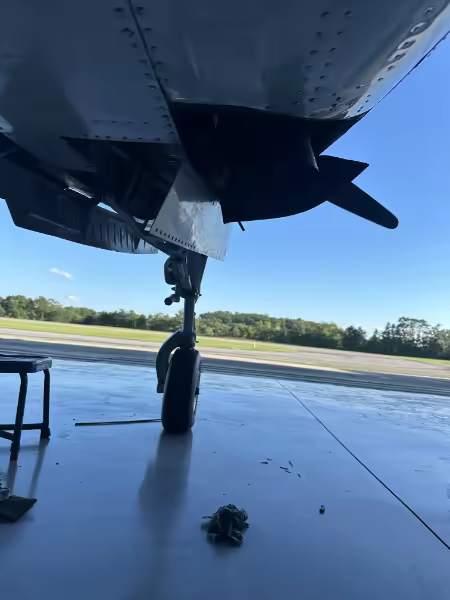 Aircraft landing gear in the Hangar13 maintenance shop